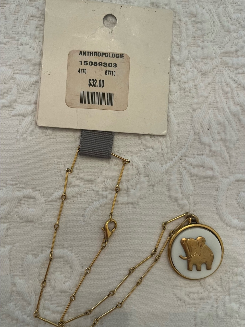 Necklace NWT Anthropologie gold chain elephant medallion